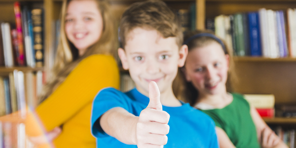 lively-kids-standing-library.jpg